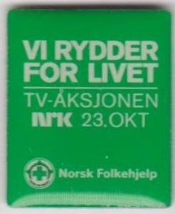 Norsk Folkehjelp TV-aksjonen pin fra 2011 (ligger i samlingen til Aksel Rigmund Hjelland)