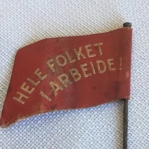 1 mai merke 1934 bakside. Merke ligger i samlingen til M. Østby